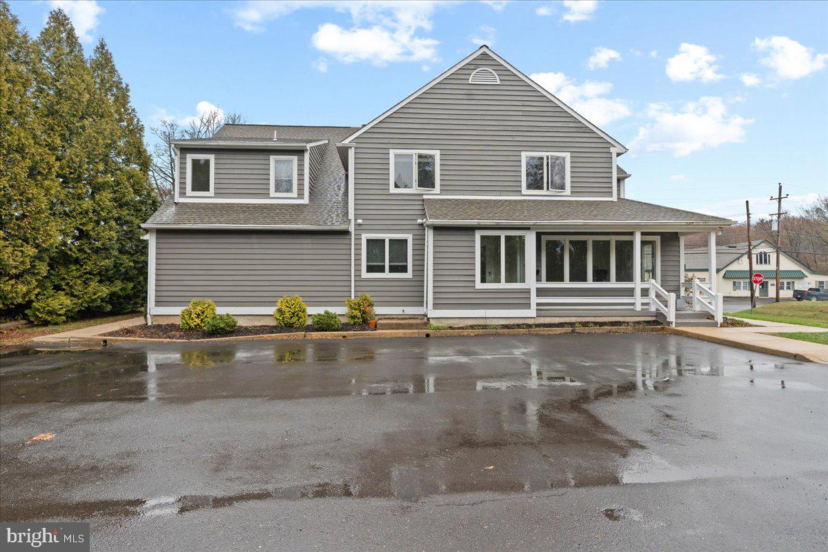 a view of a house with a swimming pool