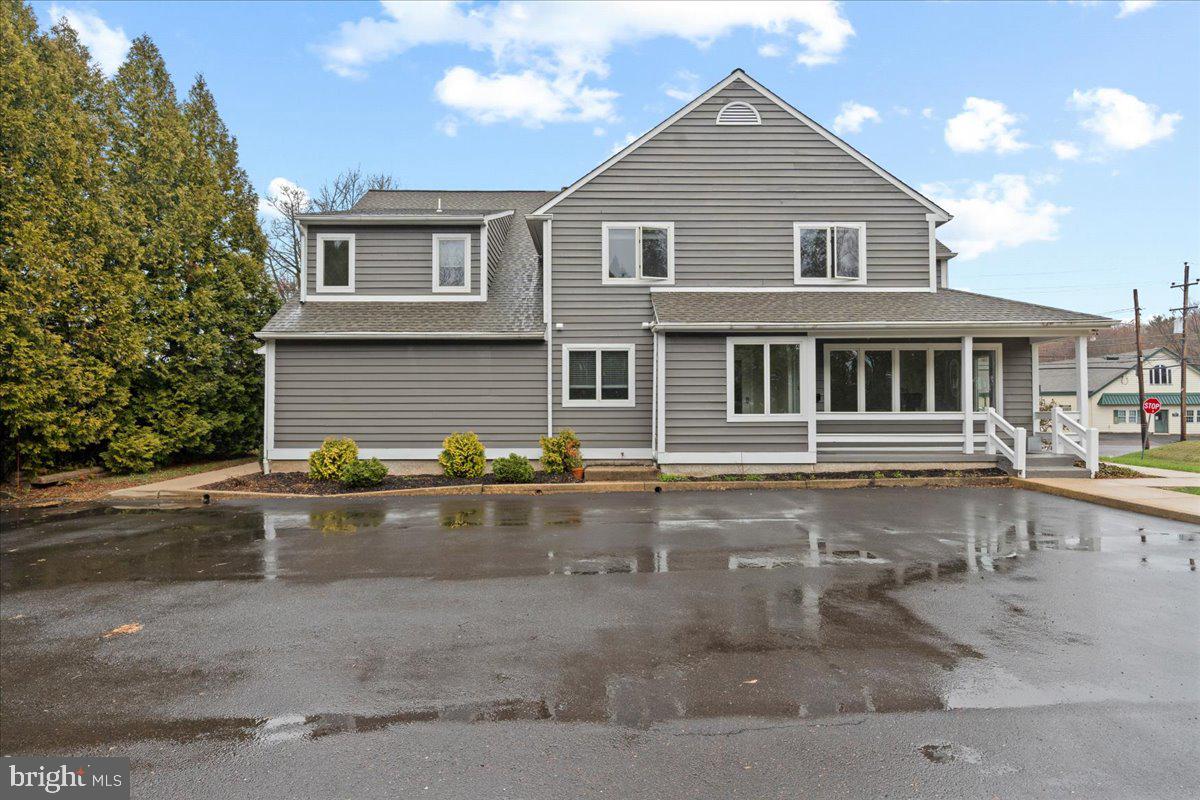 1 Center Street Doylestown, PA 18901 - Photo 2 of 12 a front view of a house with yard