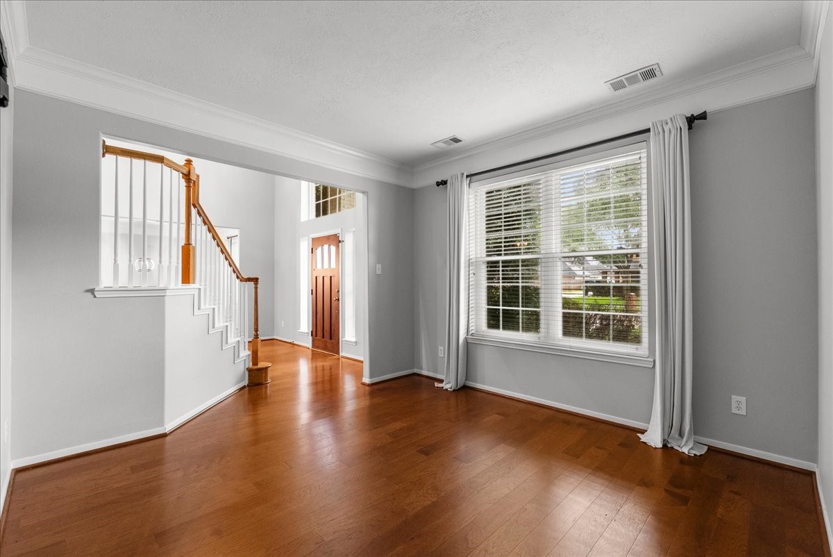 2876 Match Point Lane Friendswood, TX 77546 - Photo 26 of 45 Formal living off the entryway