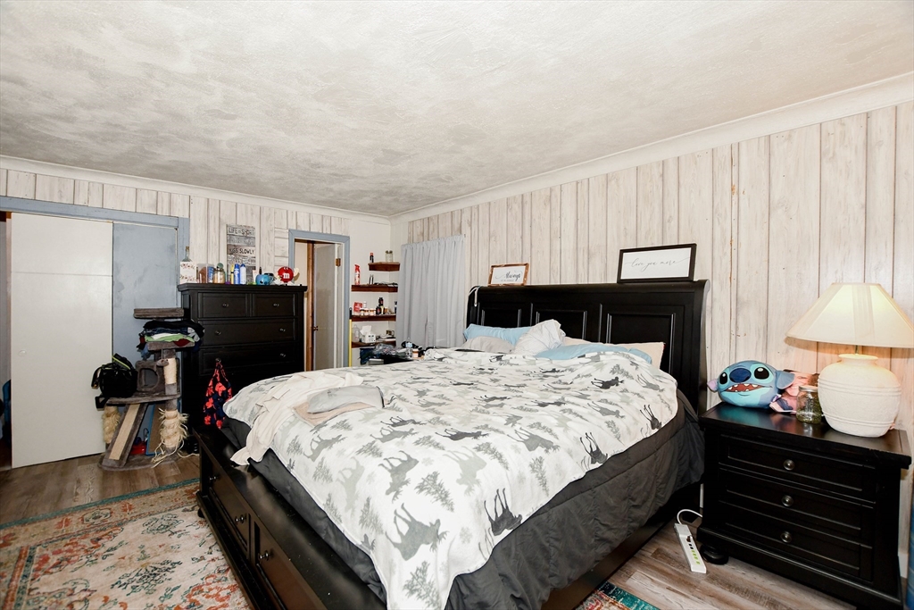 6 Gilbert Way Wareham, MA 02571 - Photo 17 of 42 a bed room with a bed and a closet