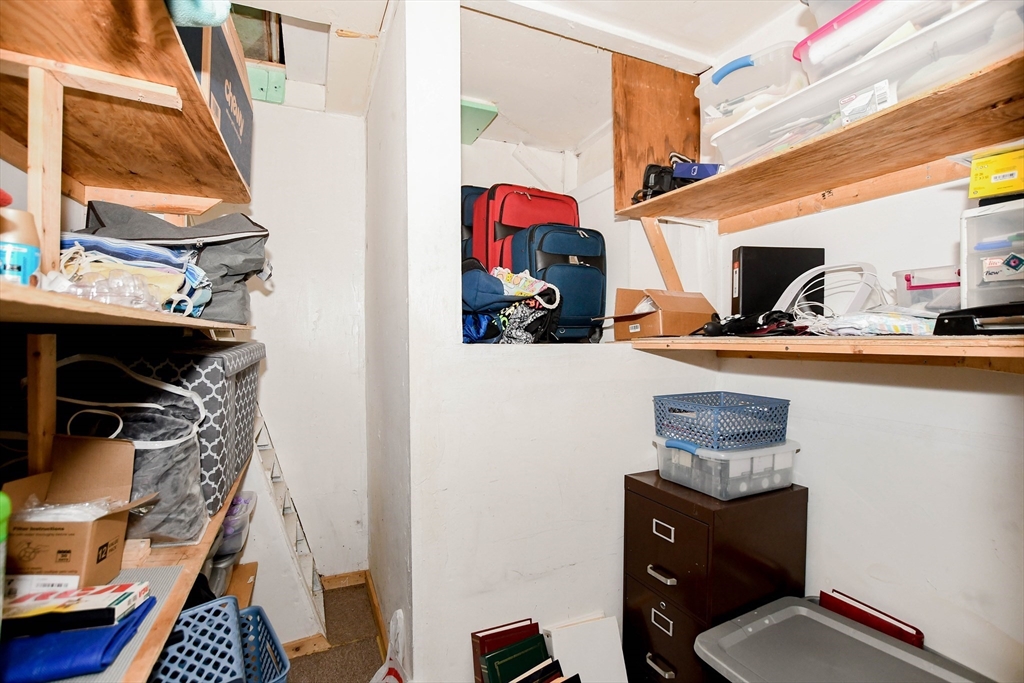 6 Gilbert Way Wareham, MA 02571 - Photo 18 of 42 a living room with furniture and a fireplace