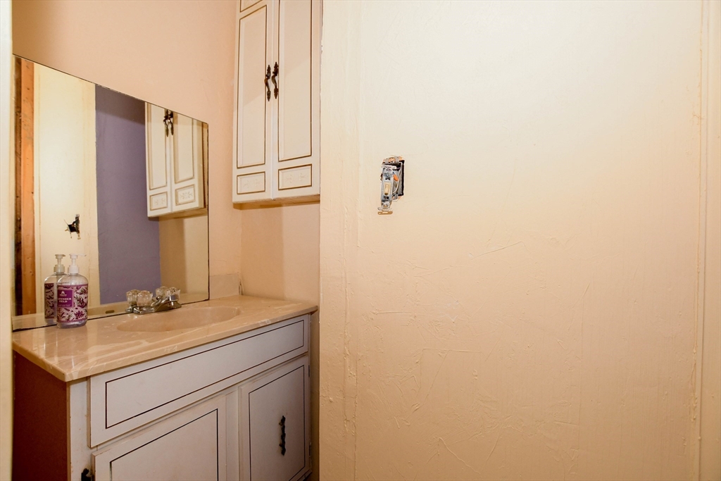6 Gilbert Way Wareham, MA 02571 - Photo 19 of 42 a bathroom with a sink and a mirror