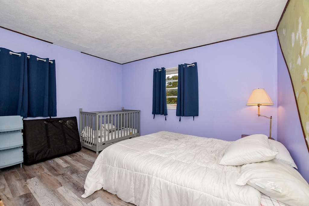 6 Gilbert Way Wareham, MA 02571 - Photo 21 of 42 a bedroom with a bed and a window