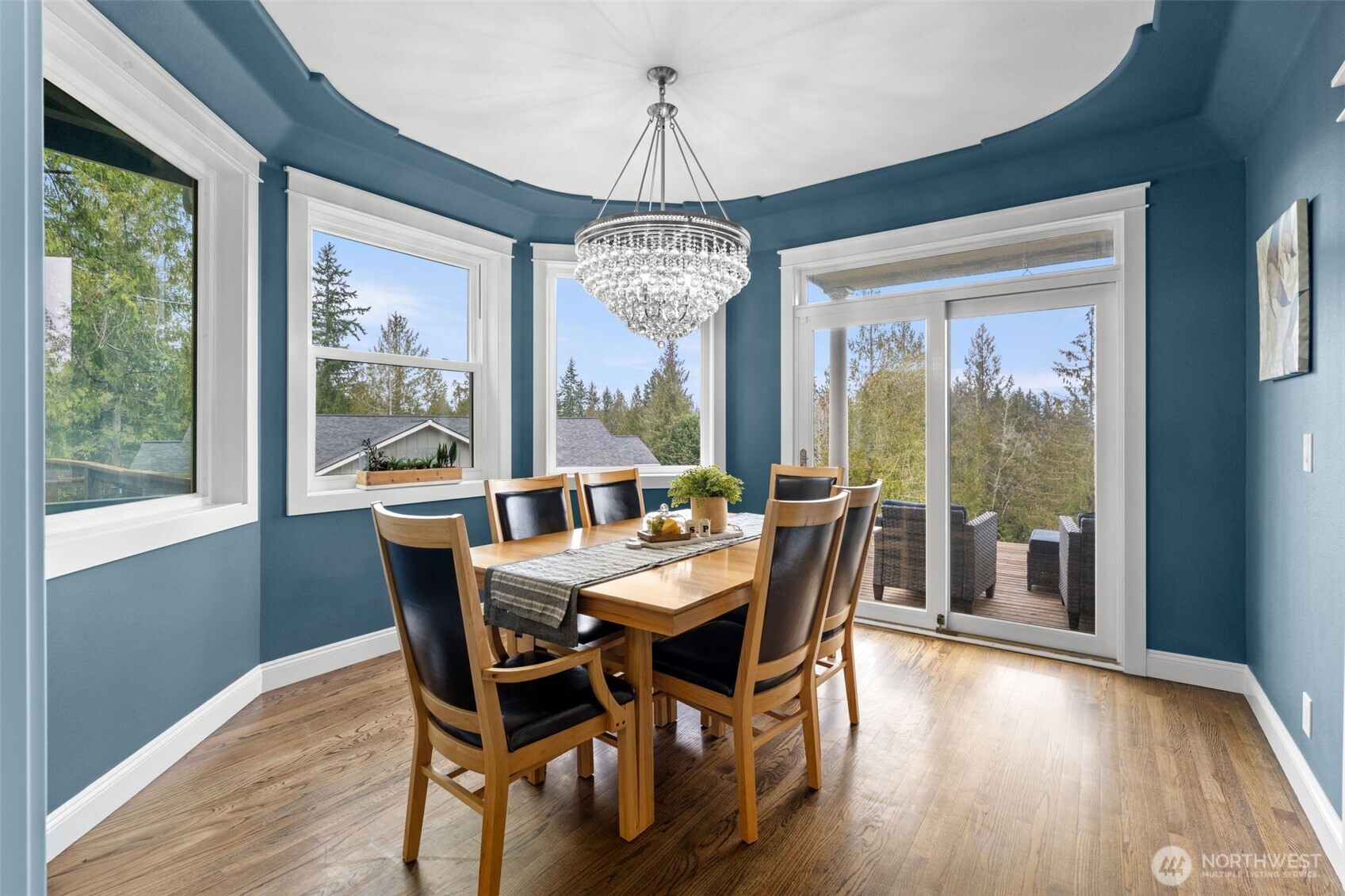 9916 Dishman Road Northwest Bremerton, WA 98312 - Photo 12 of 40 a view of a dining room with furniture window and wooden floor