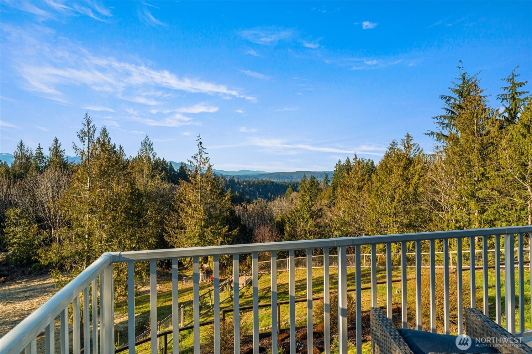 9916 Dishman Road Northwest Bremerton, WA 98312 - Photo 24 of 40 a view of balcony with wooden floor and fence