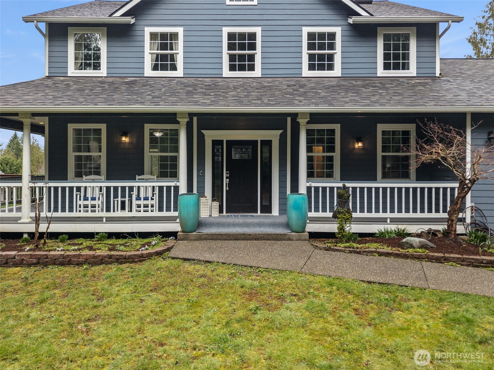 9916 Dishman Road Northwest Bremerton, WA 98312 - Photo 3 of 40 a view of a house with swimming pool and wooden fence