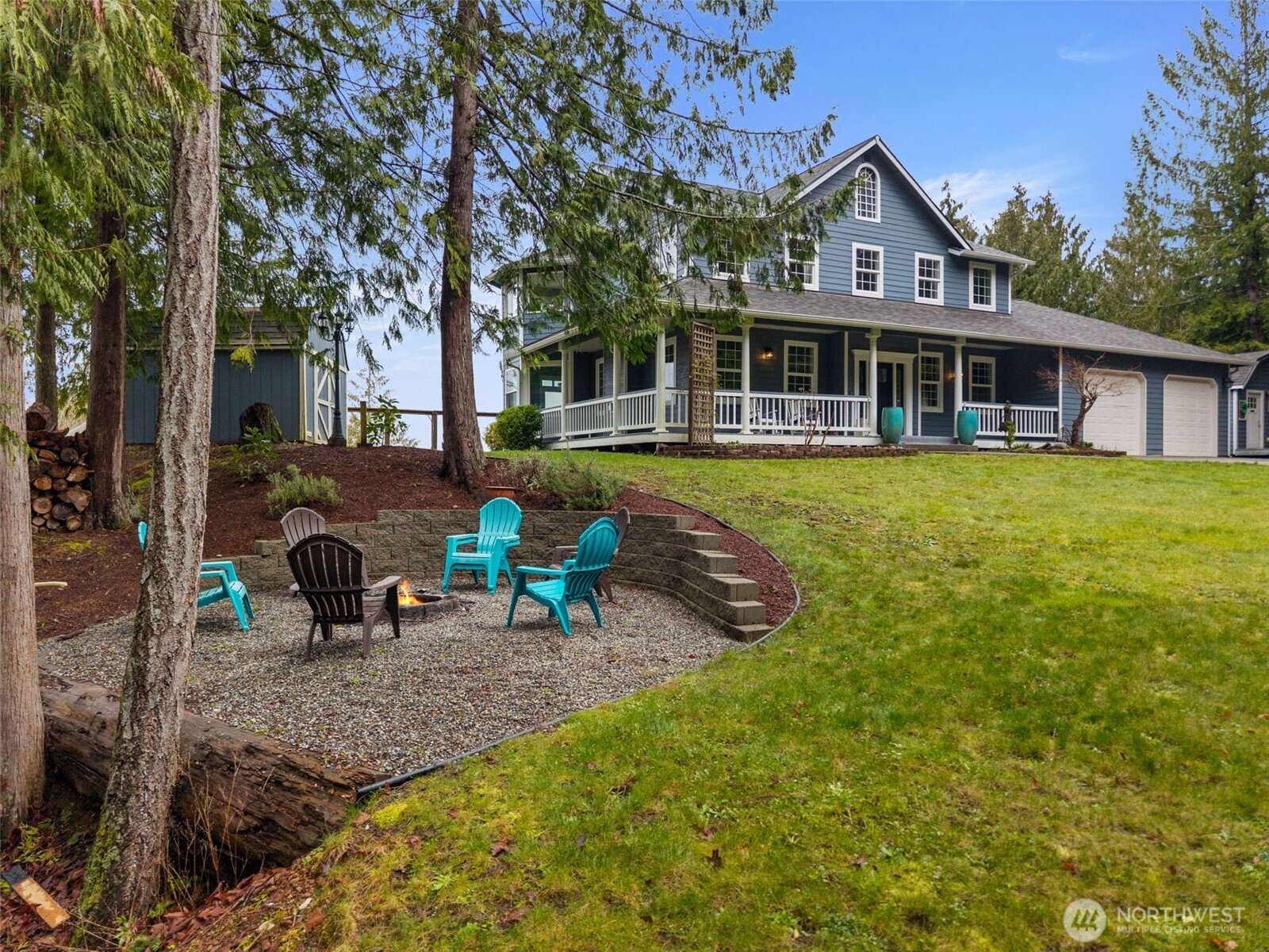 9916 Dishman Road Northwest Bremerton, WA 98312 - Photo 32 of 40 a front view of a house with patio