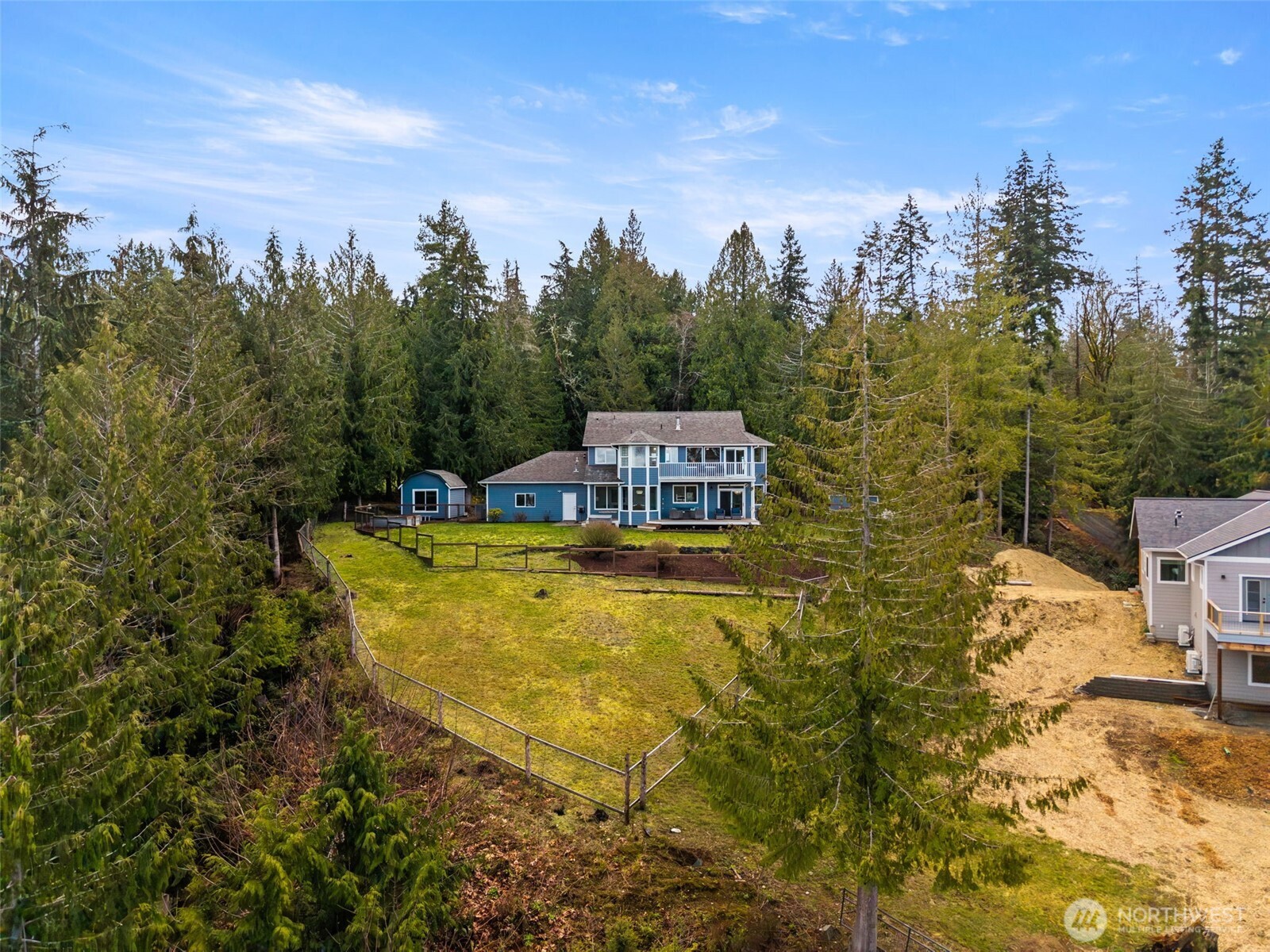 9916 Dishman Road Northwest Bremerton, WA 98312 - Photo 36 of 40 a view of a swimming pool with a patio