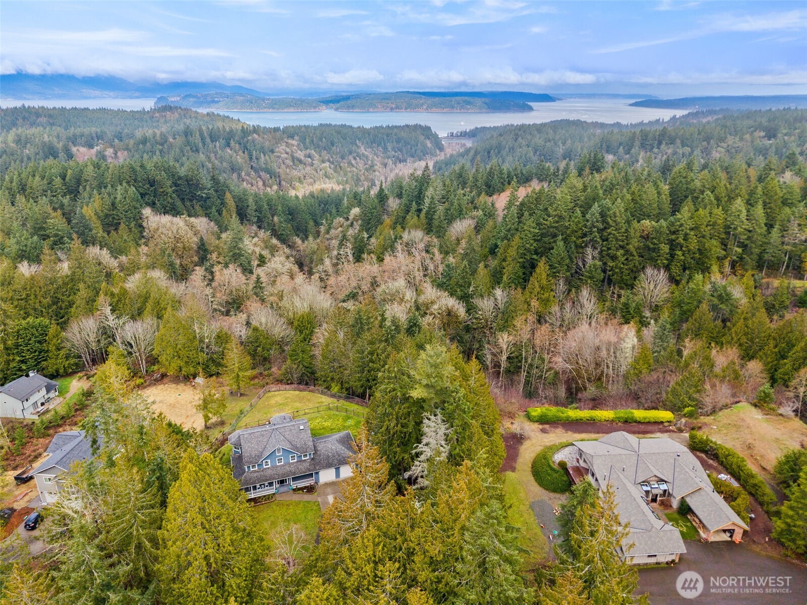 9916 Dishman Road Northwest Bremerton, WA 98312 - Photo 38 of 40 a view of a city with mountains in the background