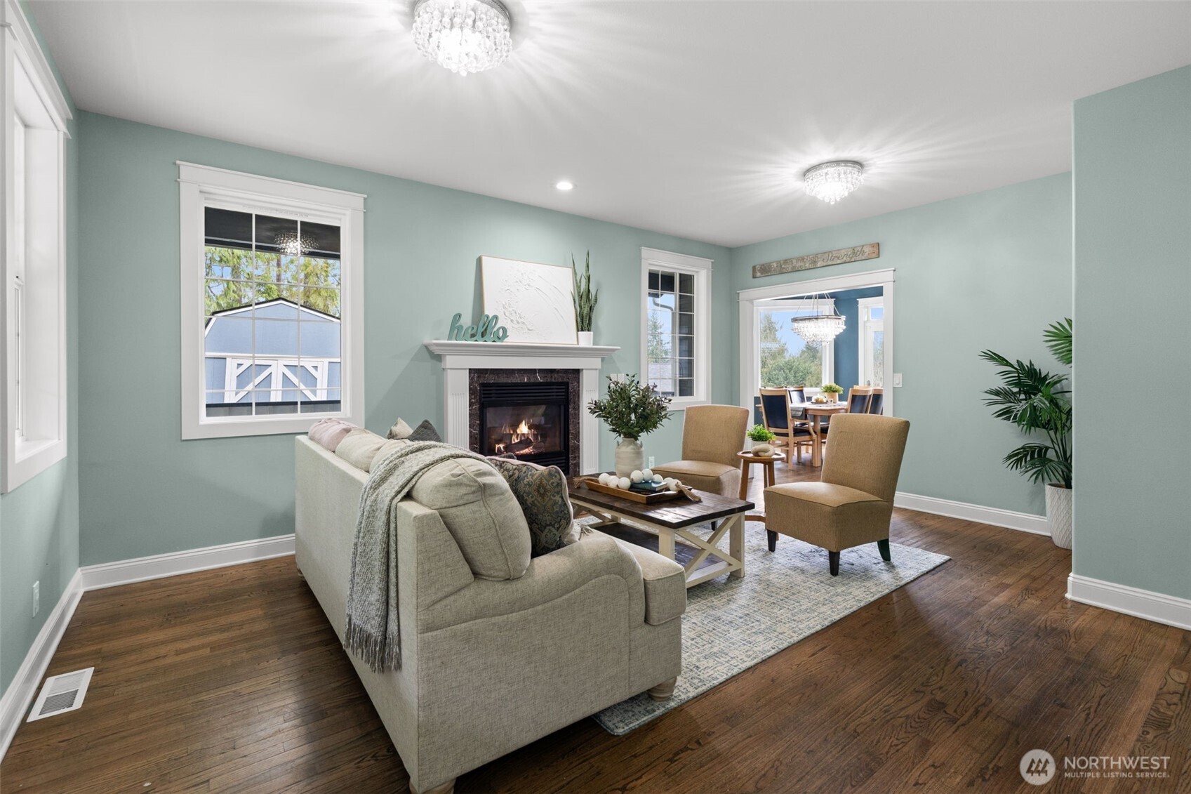 9916 Dishman Road Northwest Bremerton, WA 98312 - Photo 5 of 40 a living room with furniture and a fireplace
