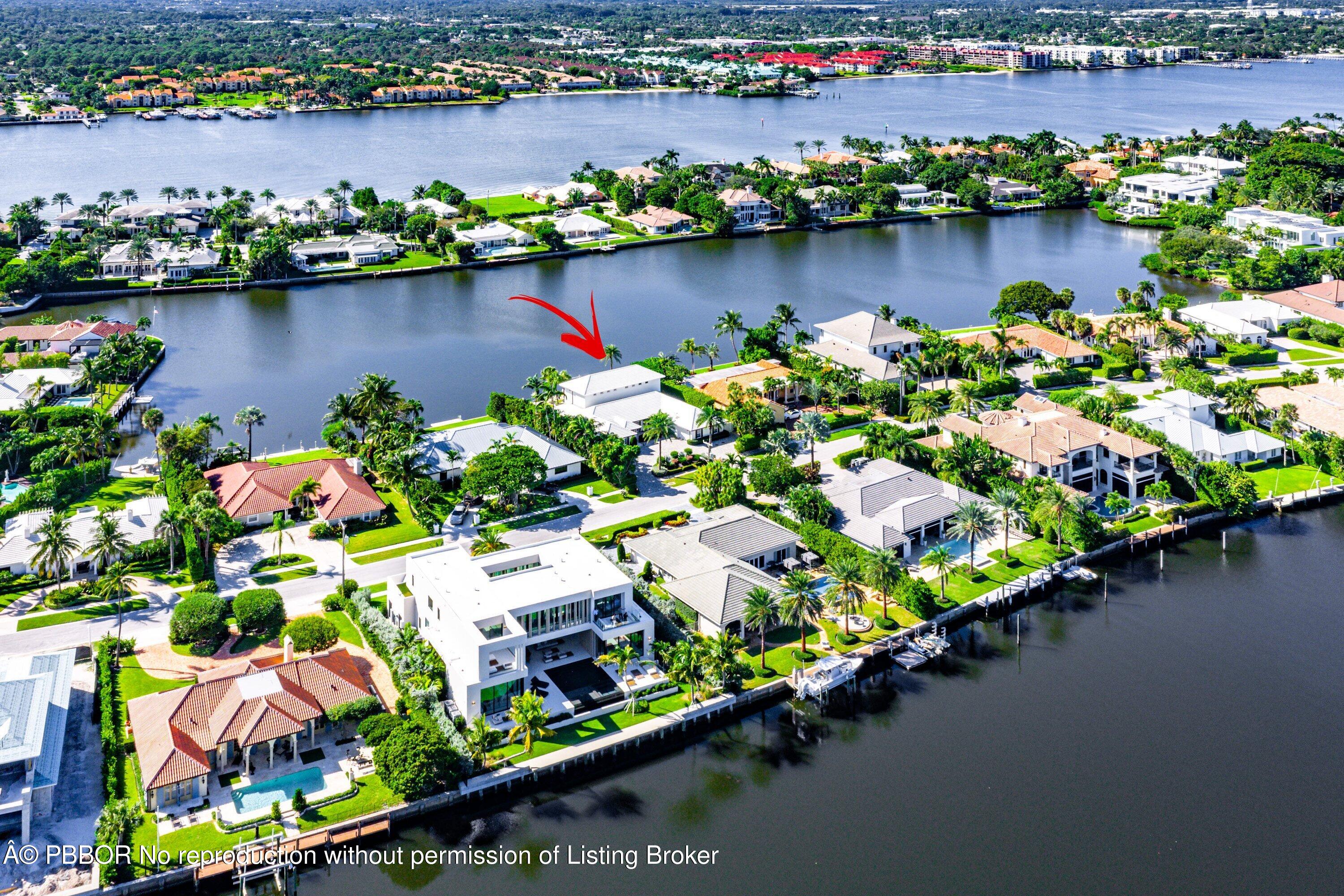 50 Spoonbill Road Lantana, FL 33462 - Photo 30 of 37 an aerial view of a houses with outdoor space and lake view