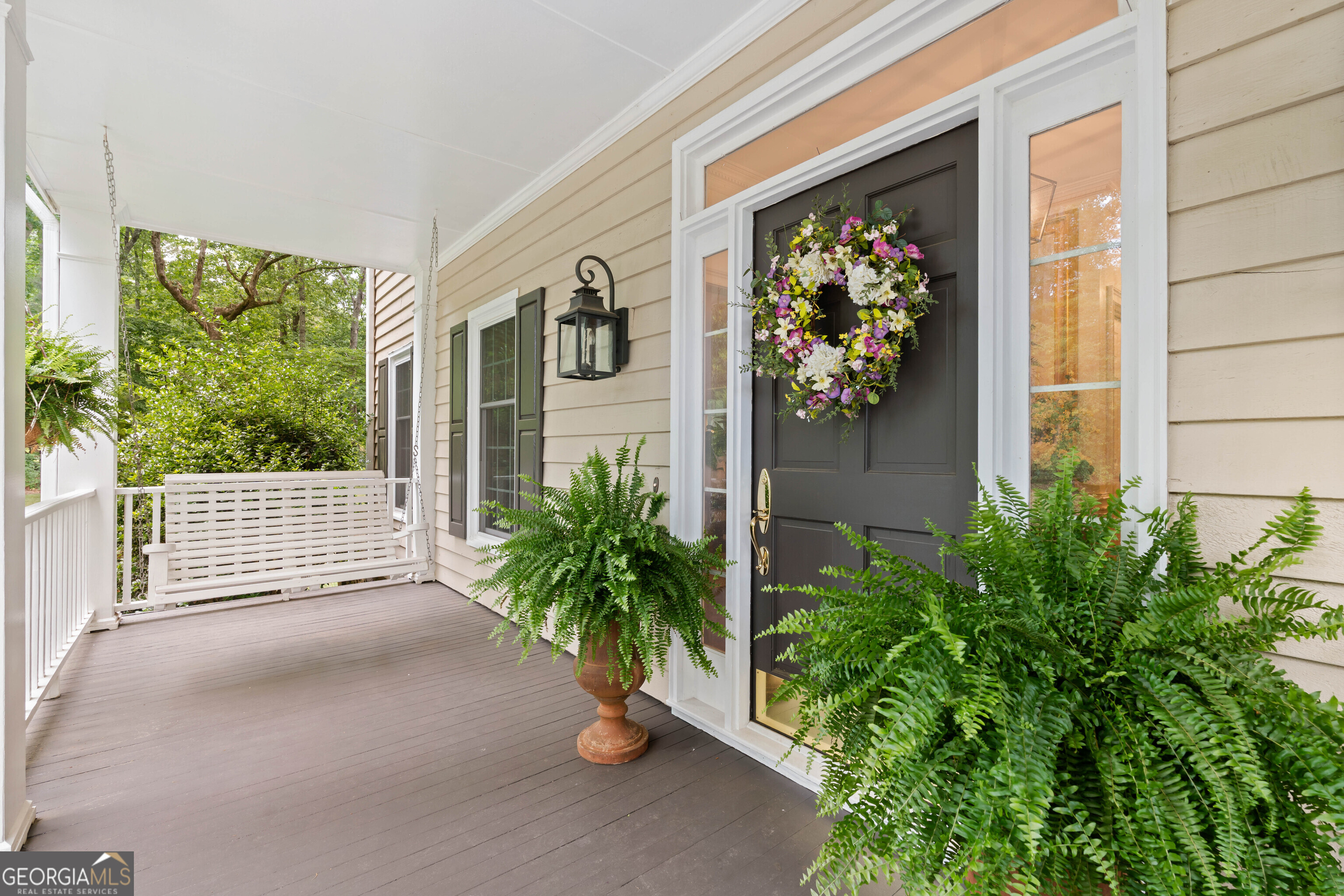 836 Oak Grove Road Carrollton, GA 30117 - Photo 8 of 50 a view of a garden with a chair