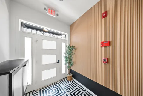a view of backyard with trampoline