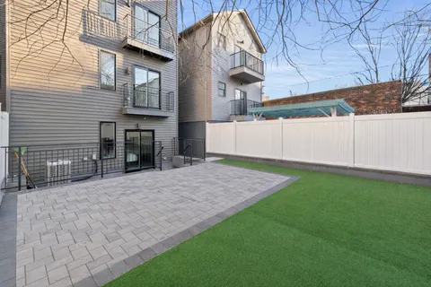 a front view of a multi story residential apartment building