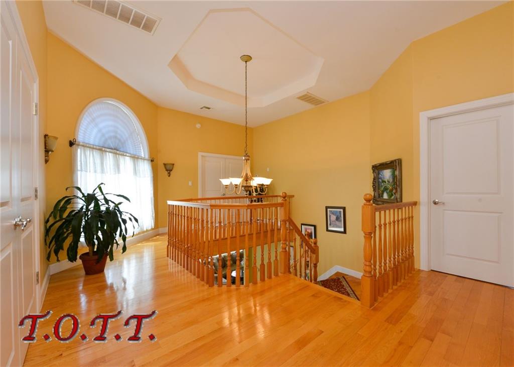 11 Bell Point Drive Brooklyn, NY 11234 - Photo 13 of 30 a view of a livingroom with furniture and floor to ceiling window