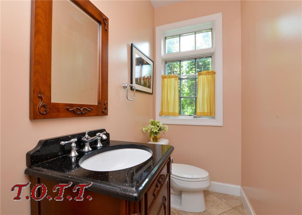 11 Bell Point Drive Brooklyn, NY 11234 - Photo 14 of 30 a bathroom with a sink and a toilet