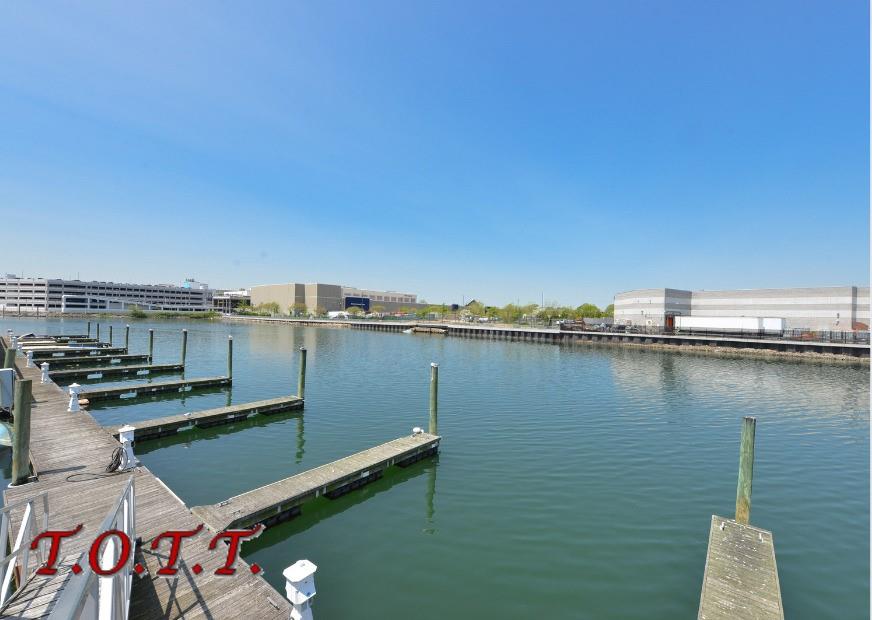 11 Bell Point Drive Brooklyn, NY 11234 - Photo 29 of 30 a view of a chairs and table in a terrace