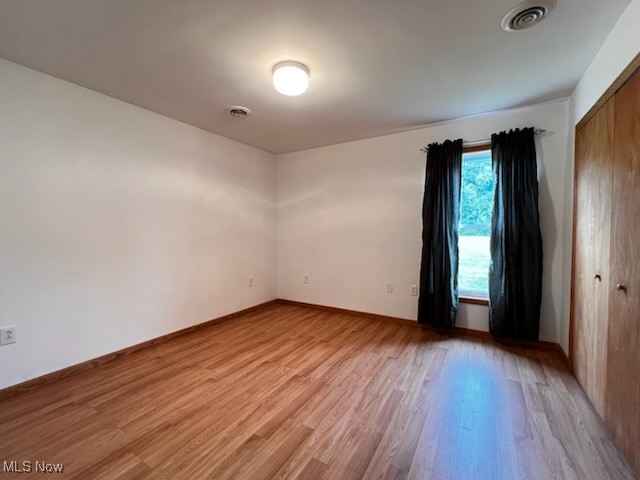 6949 Fee Road Rome, OH 44085 - Photo 13 of 19 Unfurnished room featuring light wood-type flooring