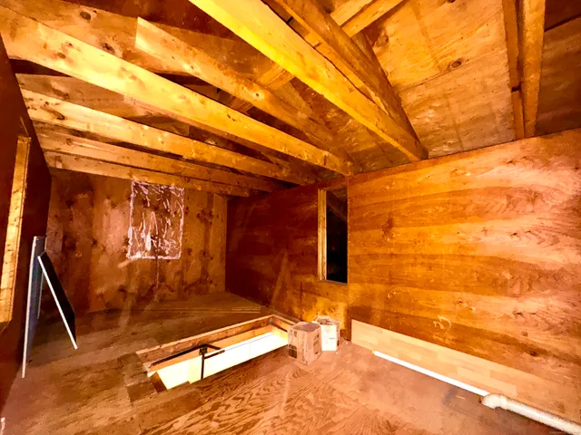 a view of backyard with a small space