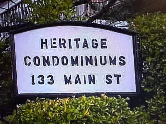 a sign on the side of a building