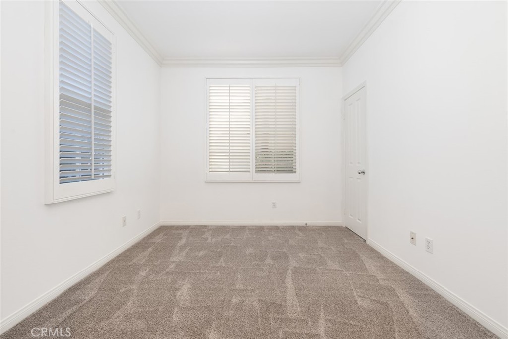 72 Clouds View Irvine, CA 92603 - Photo 17 of 43 an empty room with a window