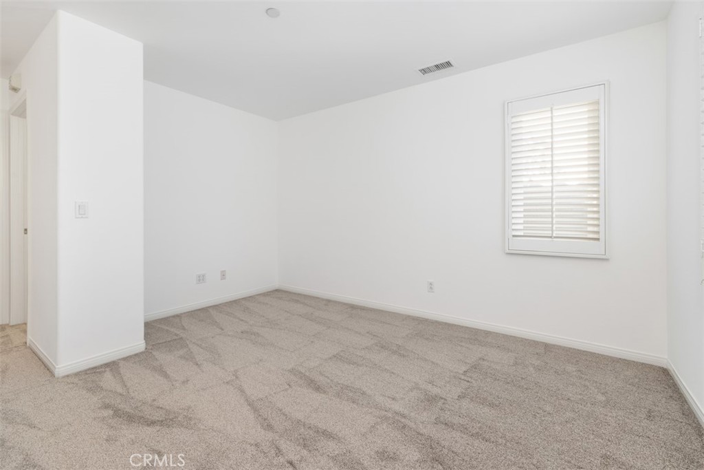 72 Clouds View Irvine, CA 92603 - Photo 20 of 43 an empty room with windows