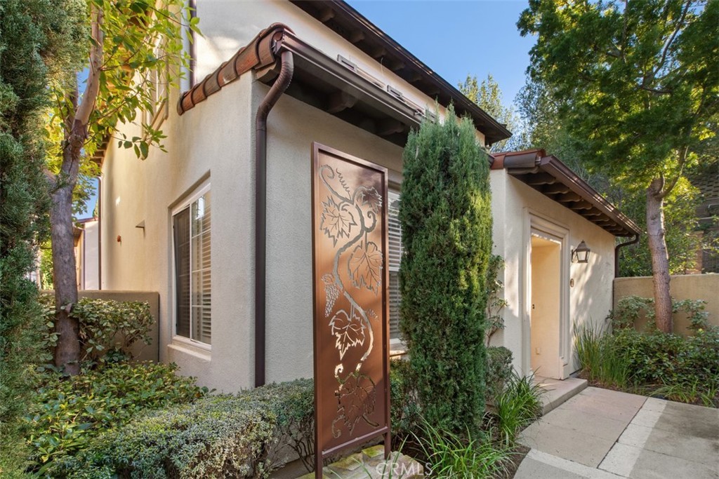 72 Clouds View Irvine, CA 92603 - Photo 2 of 43 a couple of potted plants in front of door