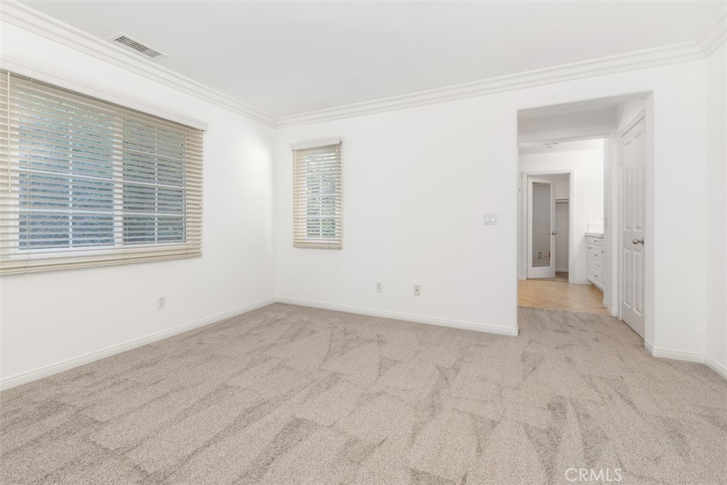 72 Clouds View Irvine, CA 92603 - Photo 22 of 43 an empty room with windows