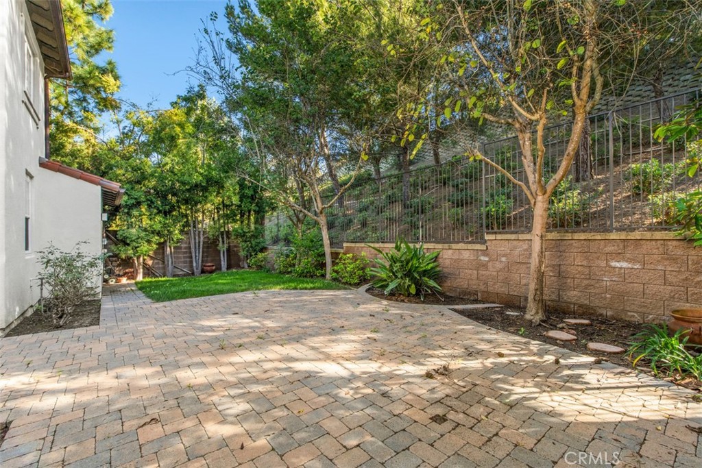72 Clouds View Irvine, CA 92603 - Photo 30 of 43 a view of a backyard with a garden