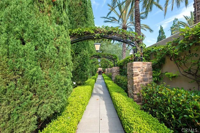 a house view with swimming pool and sitting space