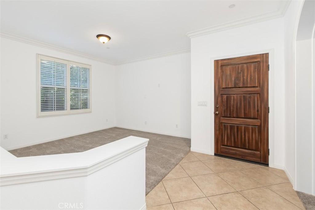 72 Clouds View Irvine, CA 92603 - Photo 7 of 43 a room with a dresser and a window
