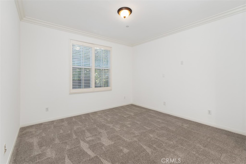 72 Clouds View Irvine, CA 92603 - Photo 8 of 43 an empty room with windows
