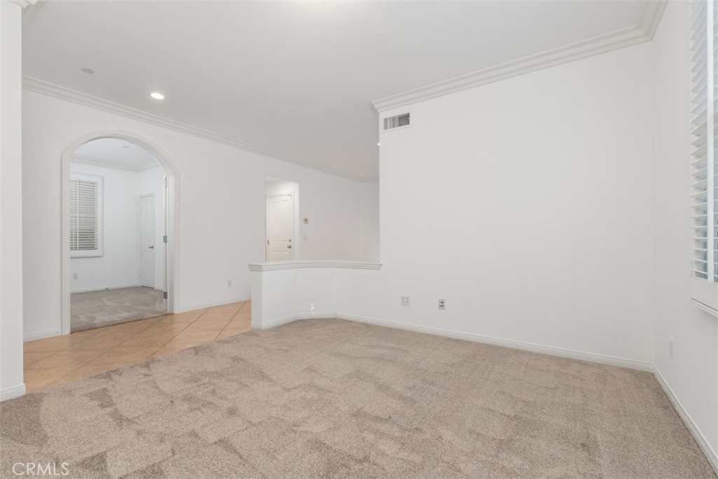 72 Clouds View Irvine, CA 92603 - Photo 10 of 43 an empty room with an entryway