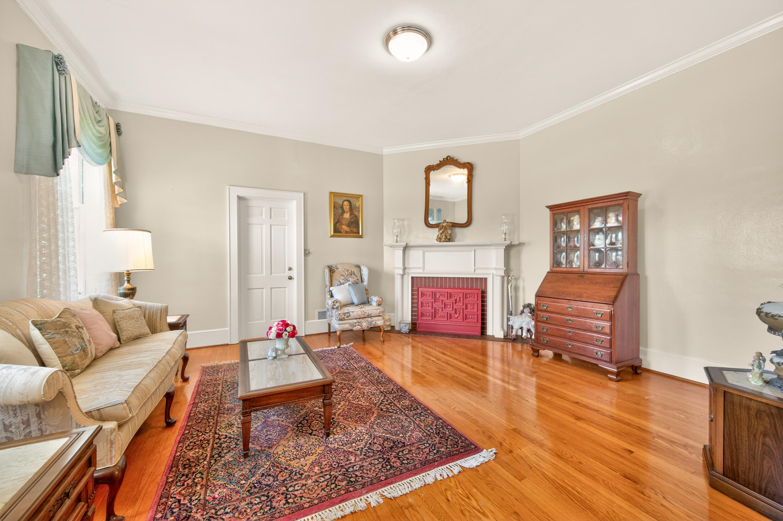 4322 Rosecrest Road Roanoke, VA 24018 - Photo 13 of 36 a living room with furniture and a fireplace