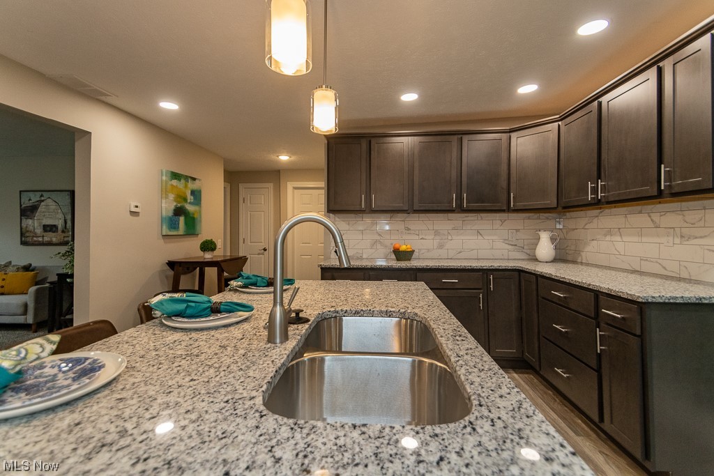 9865 Chillicothe Road Kirtland, OH 44094 - Photo 6 of 36 Kitchen with hanging light fixtures