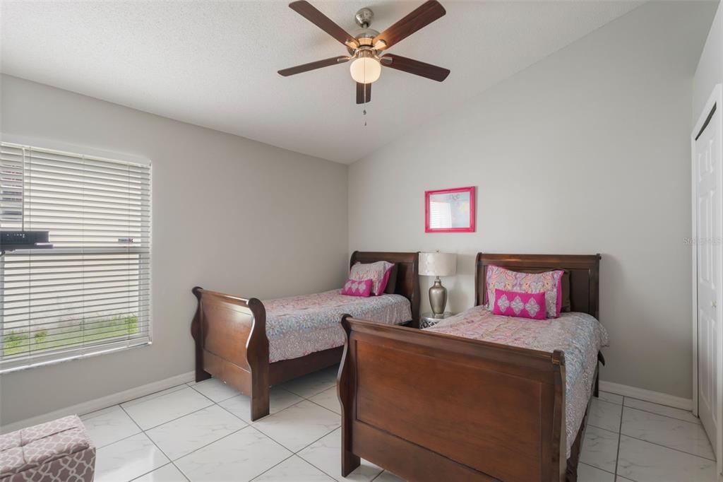 2685 Oneida Loop Kissimmee, FL 34747 - Photo 23 of 54 a living room with furniture and a window