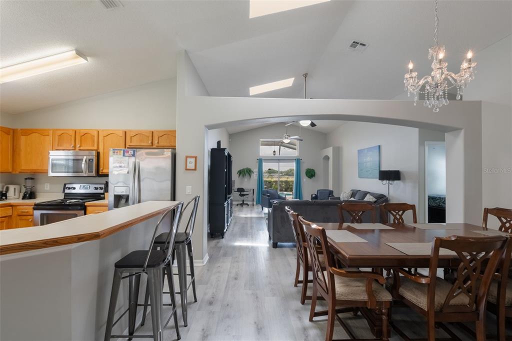 2685 Oneida Loop Kissimmee, FL 34747 - Photo 4 of 54 a view of a dining room with furniture window and outside view