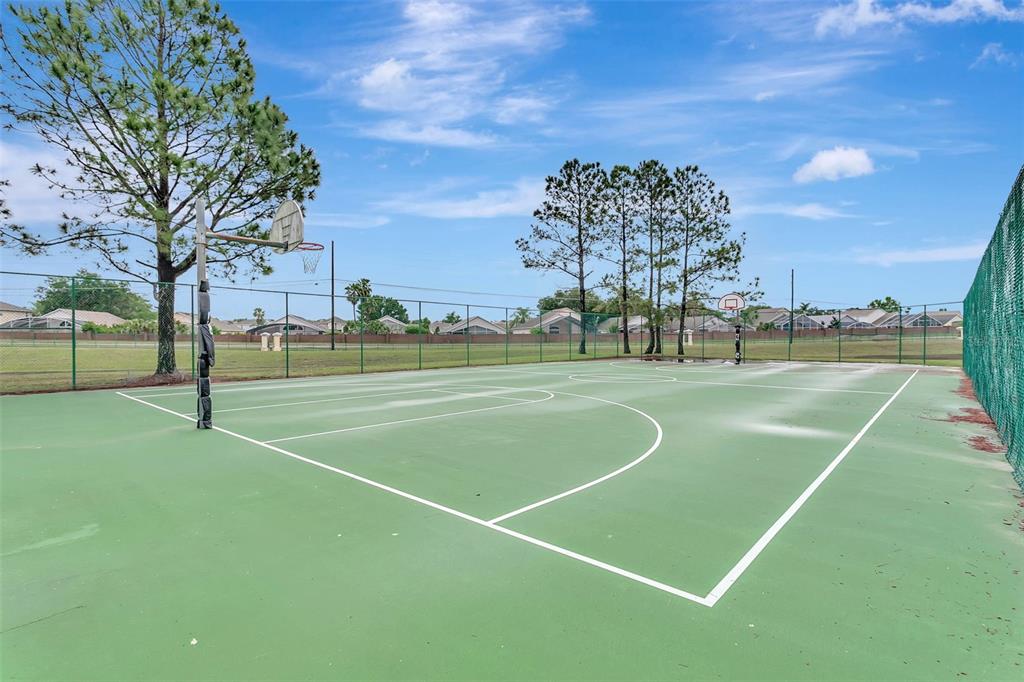 2685 Oneida Loop Kissimmee, FL 34747 - Photo 42 of 54 a view of a tennis court