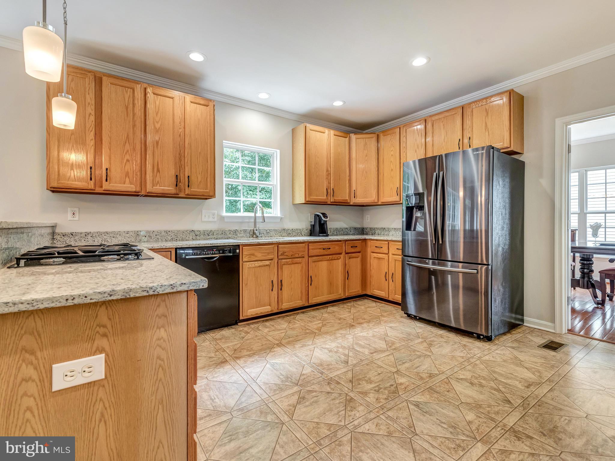 6413 Spring Forest Road Frederick, MD 21701 - Photo 8 of 30 Kitchen features new granite counter tops.
