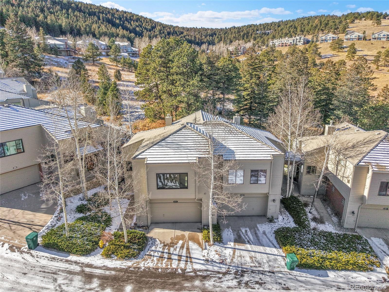 671 Trailside Drive Golden, CO 80401 - Photo 33 of 39 a front view of a house with a yard