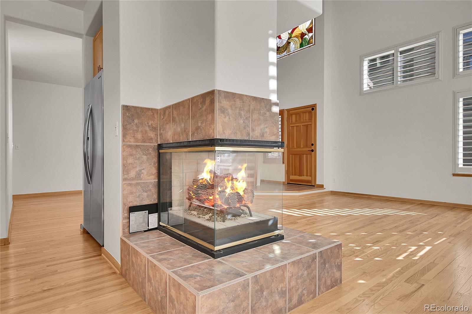 671 Trailside Drive Golden, CO 80401 - Photo 8 of 39 a living room with furniture and a table