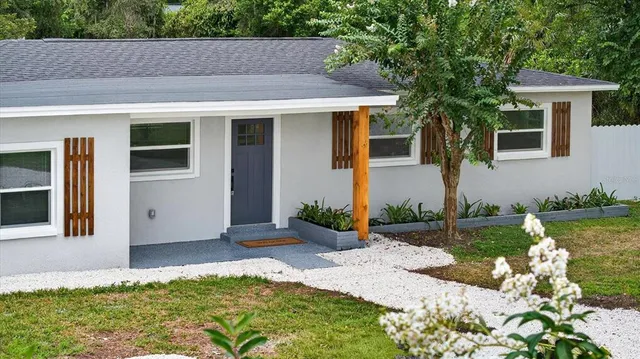 front view of a house with a yard