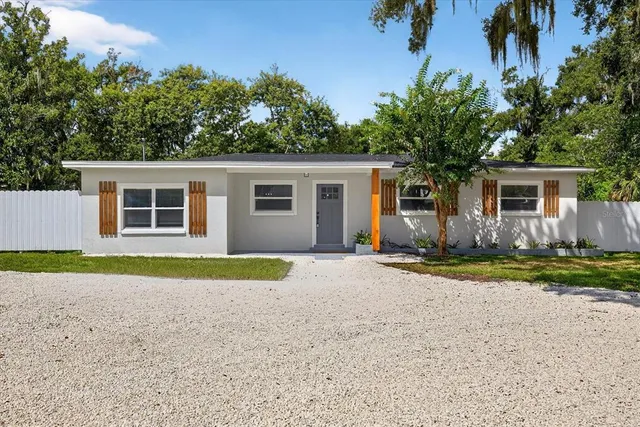 front view of a house with a yard