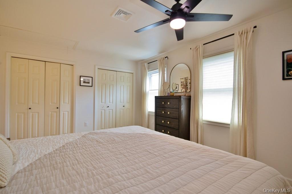104 Mallard Way Peekskill, NY 10566 - Photo 12 of 26 Two closets with organized shelving in Primary Bedroom