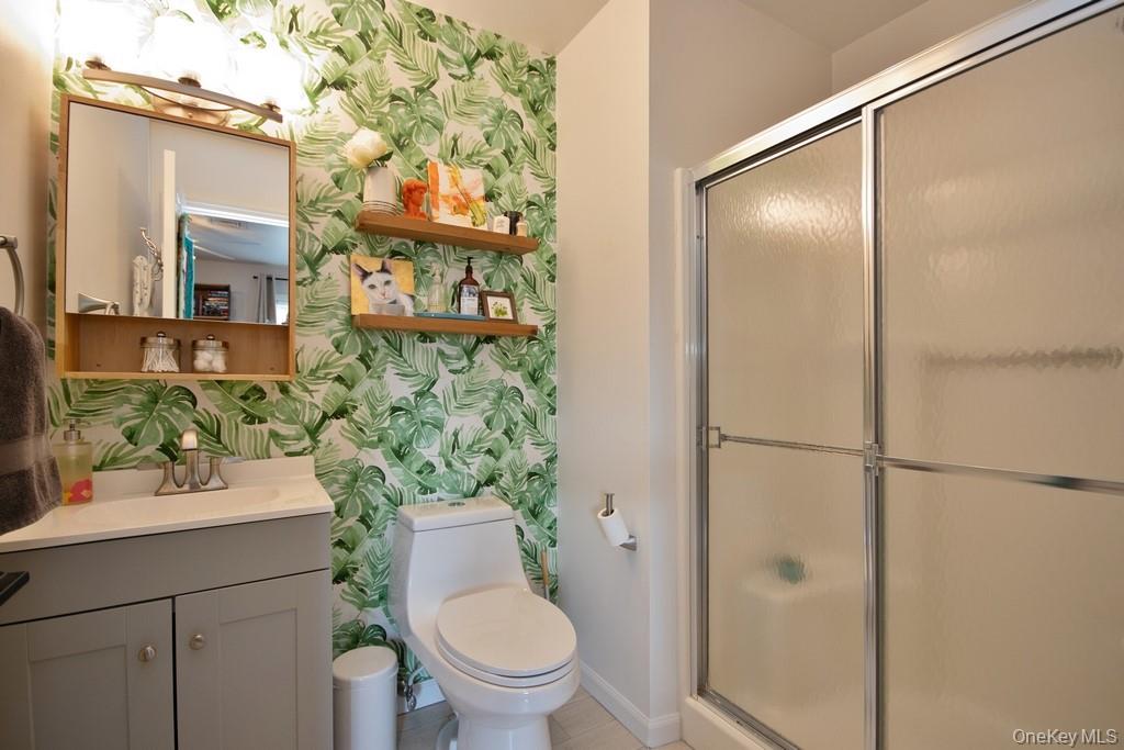 104 Mallard Way Peekskill, NY 10566 - Photo 18 of 26 Updated bathroom with stall shower and sink with vanity