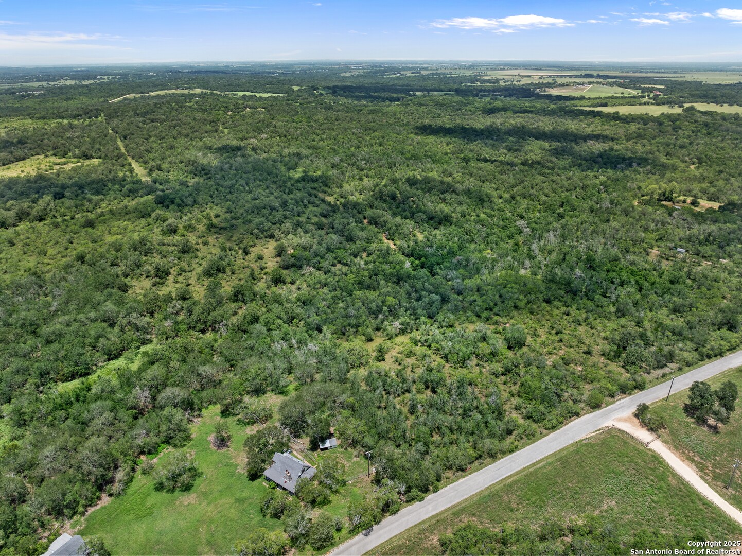 Tbd Burdette Wells Road Lockhart, TX 78644 - Photo 3 of 11 a view of a field with an ocean view
