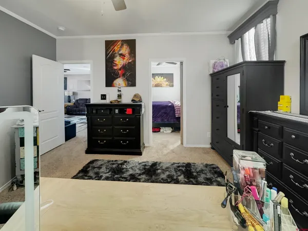 a view of living room with furniture and flat screen tv