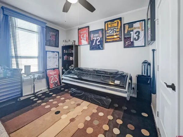 a living room with furniture and a rug