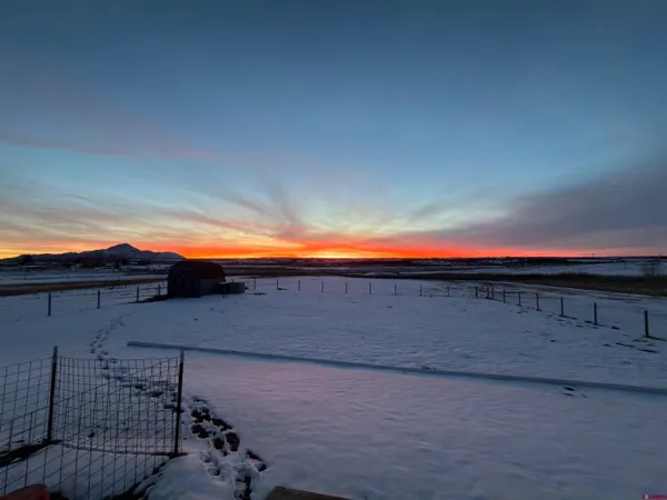 a view of outdoor space with swimming pool and furniture