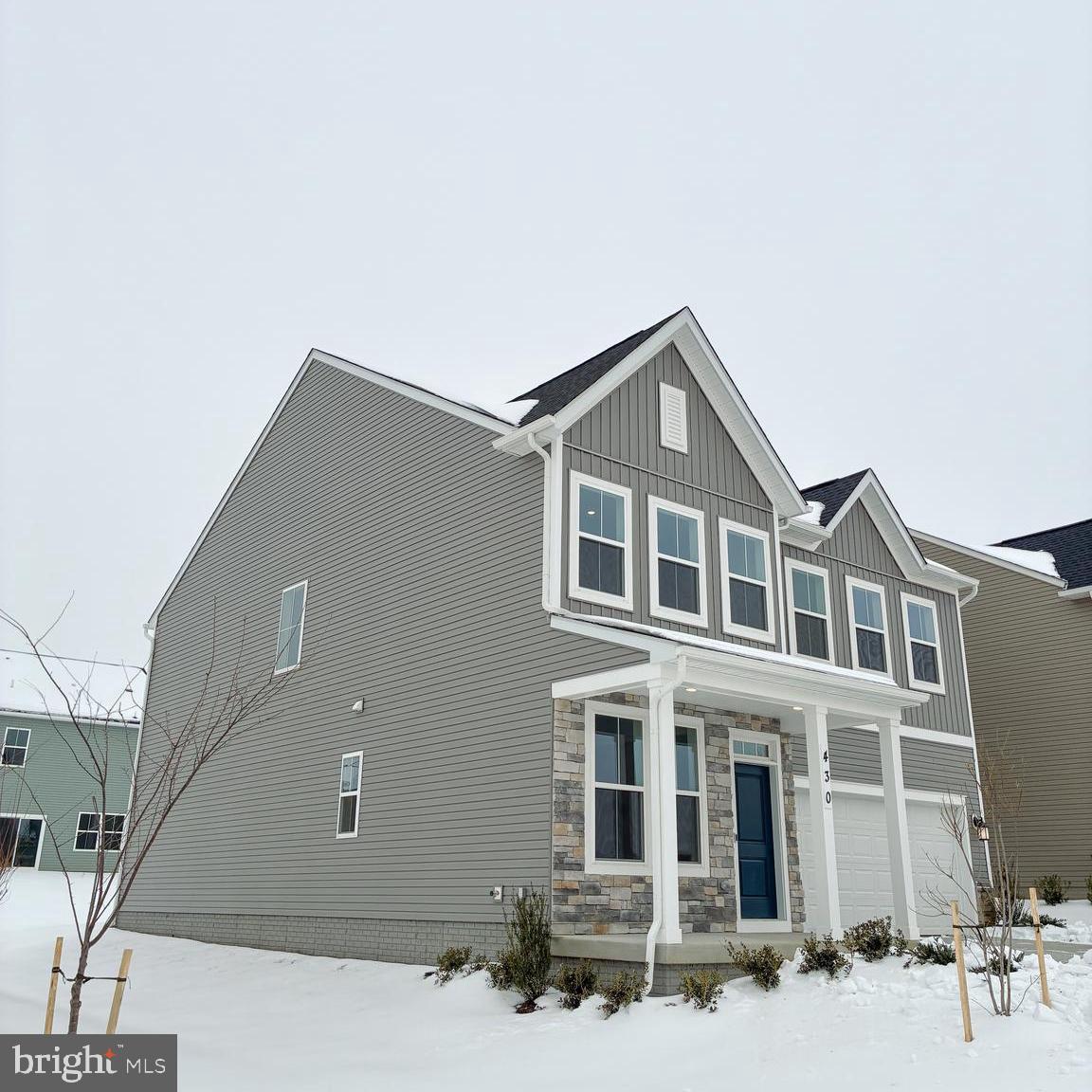 430 Silver Birch Drive Ranson, WV 25438 - Photo 1 of 11 a front view of a house with a yard